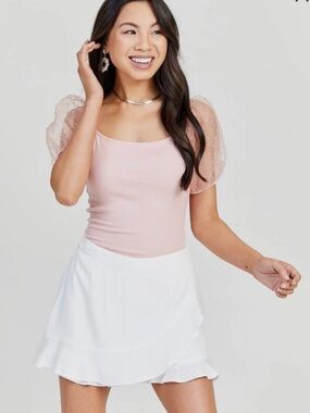 NWT Altar’d State white Quinn lined skort with ruffled hem and back zipper